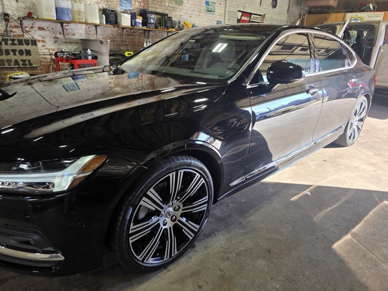Detailed black sedan with a deep glossy finish